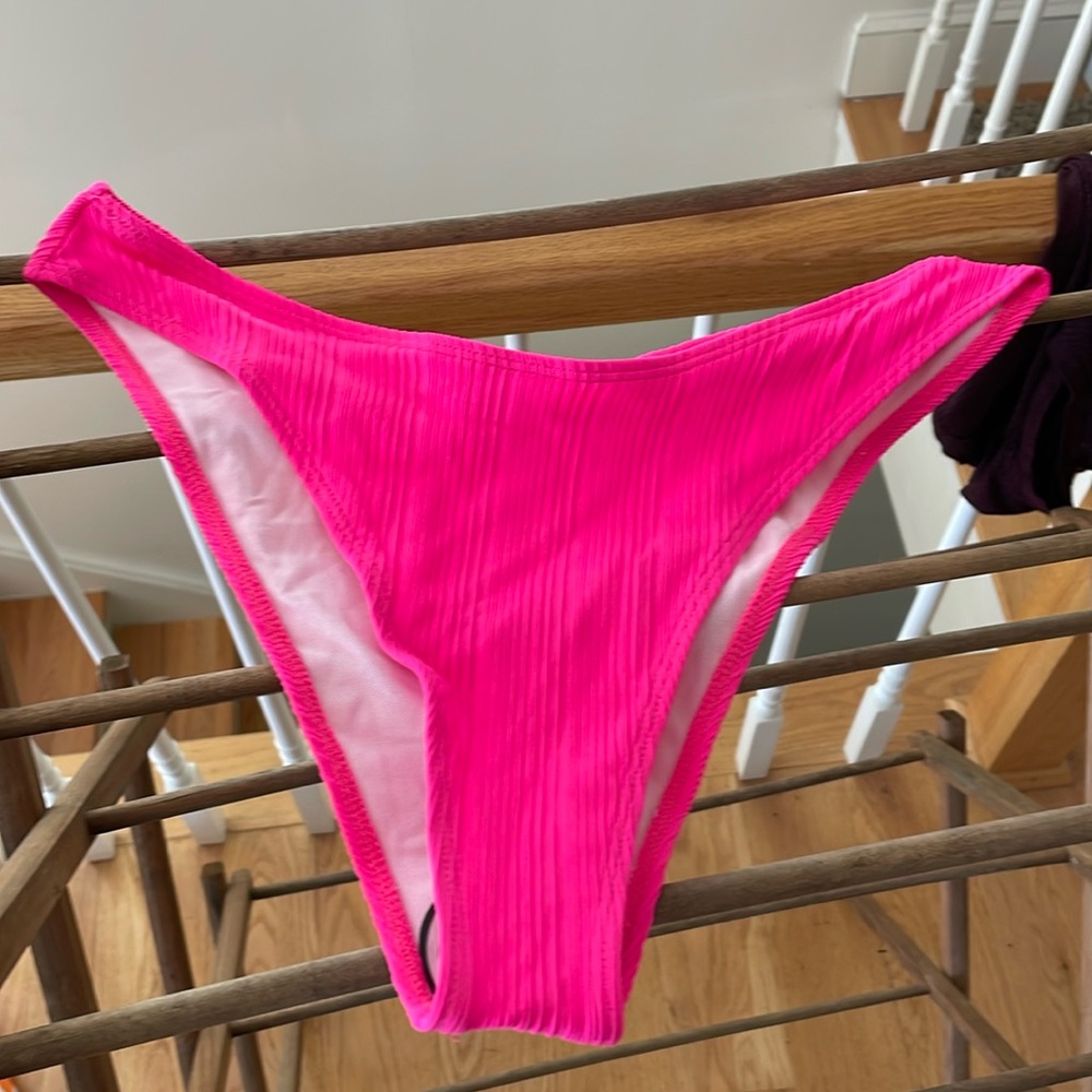 Ribbed, hot pink bikini bottoms size extra large. Never worn.